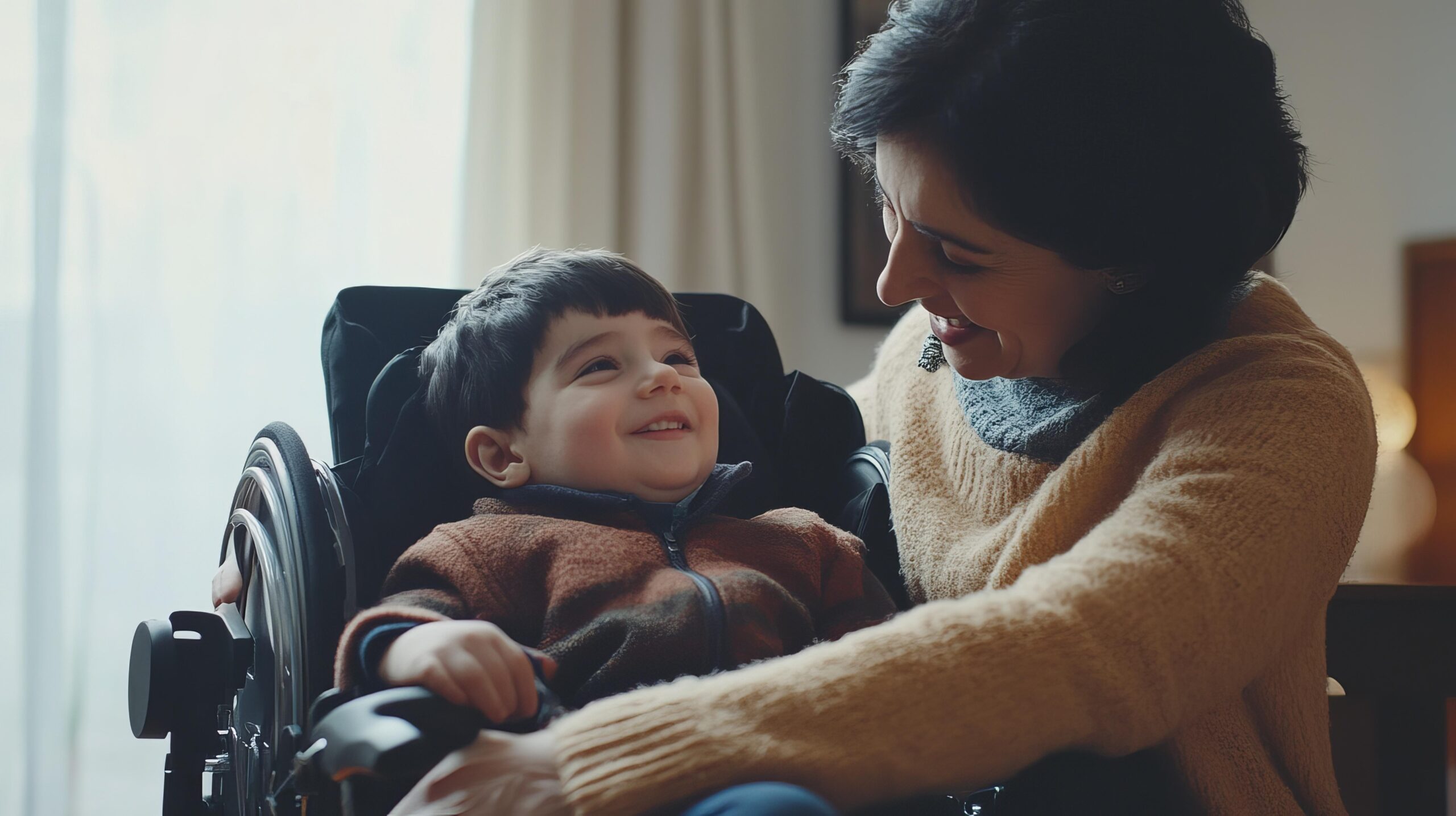 Mom showing affection to her son in a wheelchair